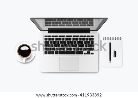 White office desk with laptop, coffee, notebook and pen. Top view with copy space. Black and white concept.