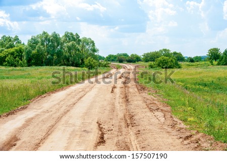 Country road on summer landscape background