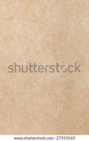 beige tanning leather close-up background