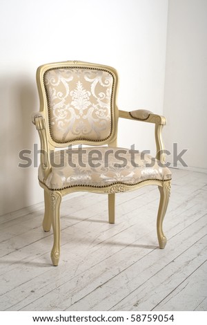 luxury armchair in a plain white interior