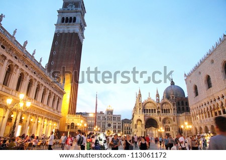 VENICE,ITALY-CIRCA JUNE 2012: Tourists enjoy the historical city of Venezia at night in Italy, famous UNESCO World Heritage Site, circa June 2012 in Venice, Italy