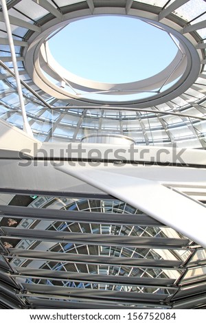BERLIN, GERMANY-DECEMBER, 7: The Reichstag dome is a glass dome constructed on top of the rebuilt Reichstag building in Berlin, symbolize the reunification of Germany on December 7, 2012 in Berlin.