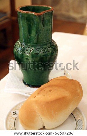 Bread and jar of  wine in a Spanish  restaurant