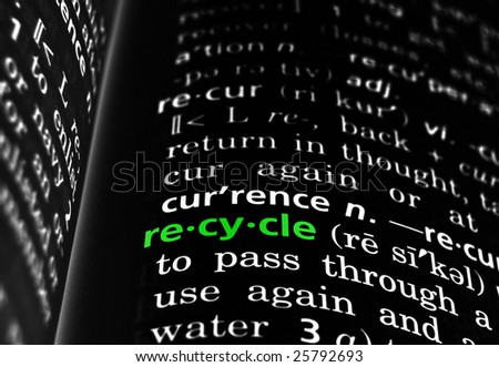 The word recycle in a dictionary, green on black