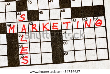 The Words Sales and Marketing on Crossword Puzzle in Red Ink, Copy Space