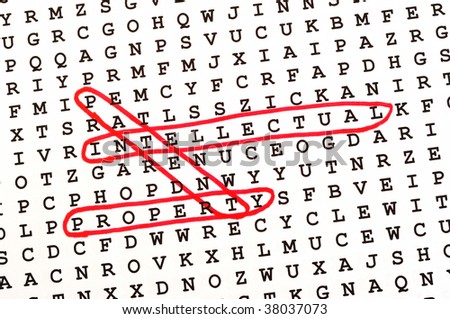 The Words Intellectual, Property, & Patent on Word Search Puzzle Circled in Red Ink