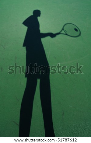 Shadow Of Tennis Player on an Outdoor Court