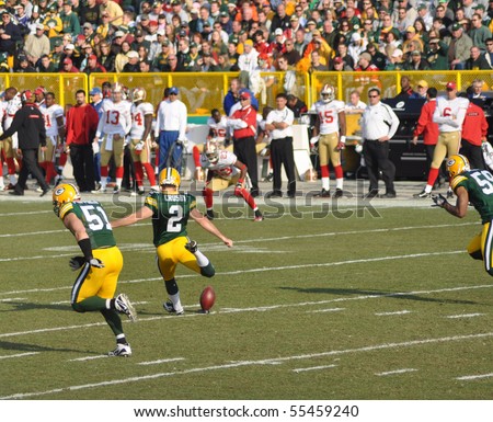 GREEN BAY, WI - NOVEMBER 22 : Green Bay Packers kicker Mason Crosby prepares to kick off in a game at Lambeau Field against the San Francisco 49ers on November 22, 2009 in Green Bay, WI