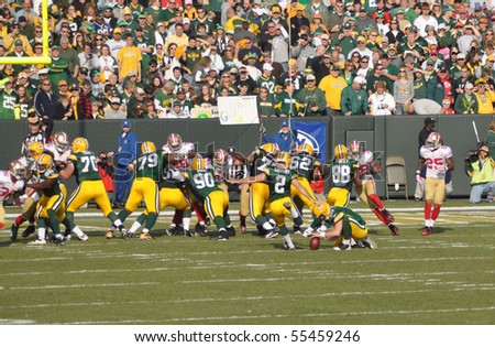 GREEN BAY, WI - NOVEMBER 22 : Green Bay Packers kicker Mason Crosby attempts a field goal in a game at Lambeau Field against the San Francisco 49ers on November 22, 2009 in Green Bay, WI