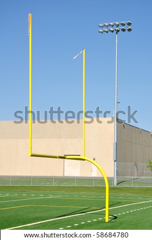 Yellow Goal Posts on American Football Field