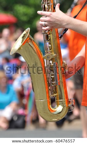 Marching Band Performer Playing  Saxophone in Parade