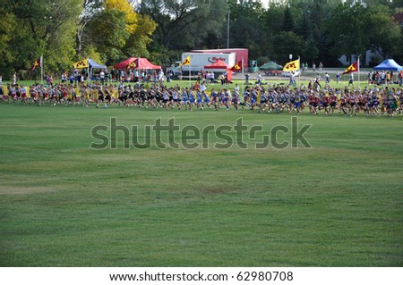 ST. PAUL, MN - SEPTEMBER 26 : The start of the Roy Griak Invitational Cross Country Meet with teams from numerous Minnesota high schools participating on September 26, 2009 in St. Paul, MN