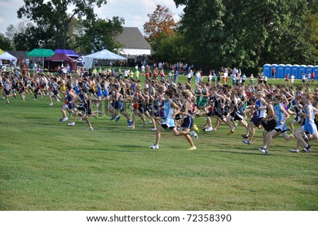 ST. PAUL, MN - SEPTEMBER 26 : The start of the Roy Griak Invitational Cross Country Meet with teams from numerous Minnesota high schools on September 26, 2009 in St. Paul, MN