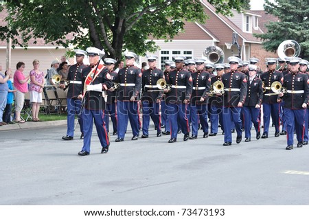 OSSEO, MN - JUNE 26 : The USMC Marine Forces Reserve Band Marching in the Osseo Marching Band Festival on June 26, 2010 in Osseo, MN