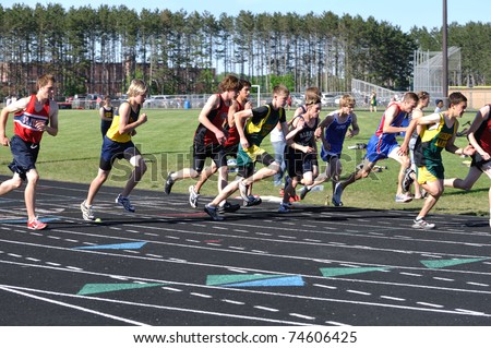 NORTH BRANCH, MN - MAY 27: Unidentified Teen Boys Starting a Long Distance High School Track Meet Race on May 27, 2010 in North Branch, Minnesota.