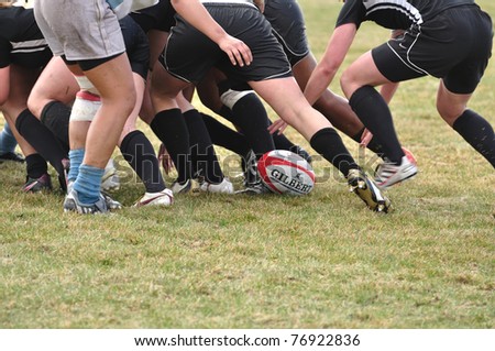 BLAINE, MN - APRIL 30: A scrum in women\'s collegiate rugby match between Army and the North Carolina Tar Heels in the NCAA Division I College Championship quarterfinals on April 30, 2011 in Blaine, MN