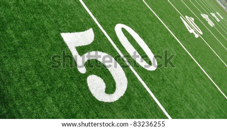 View From Above of 50 Yard Line on American Football Field With Artificial Turf