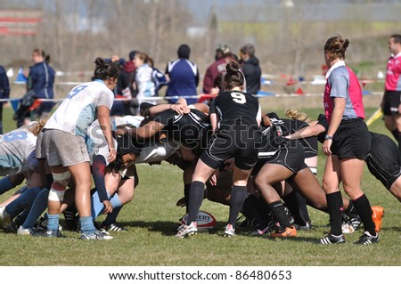 BLAINE, MN - APRIL 30: Unidentified women participate in a scrum during a women\'s collegiate rugby match between Army & the North Carolina Tar Heels in the NCAA Division I College Championship quarterfinals on April 30, 2011 in Blaine, MN