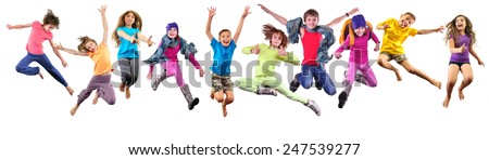 Large group of happy cheerful sportive children jumping and dancing. Isolated over white background. Childhood, freedom, happiness concept.
