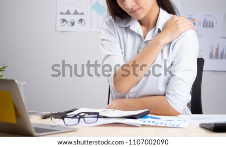 Young office woman Shoulder pain concept Office Syndrome