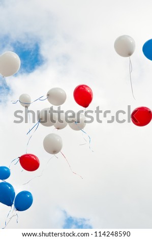 multi-colored balloons in the sky