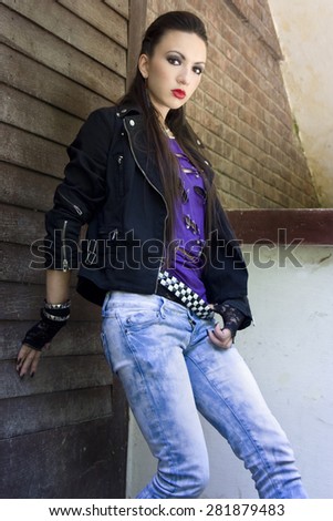 Beautiful girl dressed in punk style