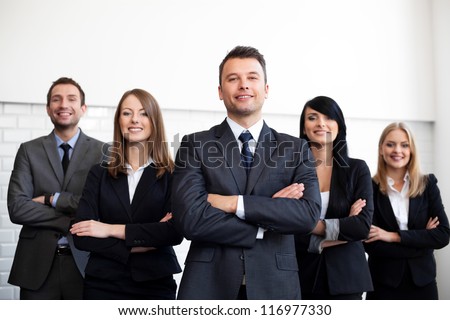 Group of business people with businessman leader on foreground