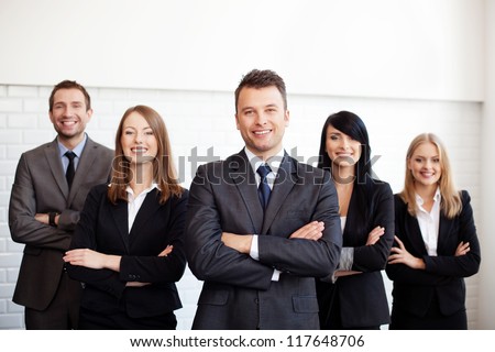 Group Of Business People With Businessman Leader On Foreground