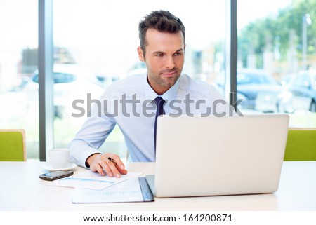 Man Working At The Office On Laptop