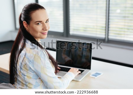 Photo of an HR specialist working at the desk