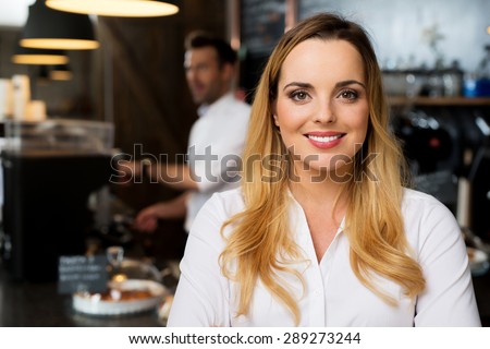 Portrait of happy small business, restaurant owner