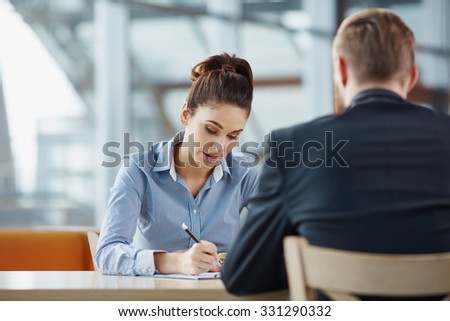 Businessman and businesswoman during job interview