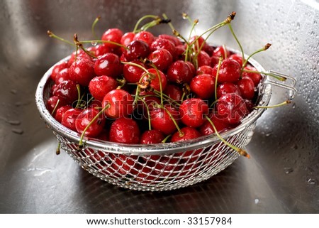 wet fresh cherry in sink