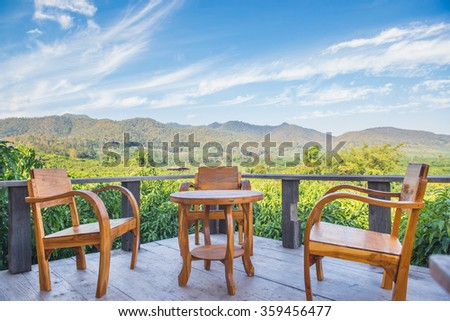 wood chair in home terrace with beautiful natural scenic.