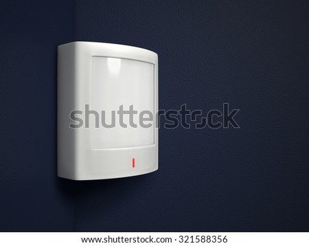 A passive infrared sensor (PIR) on a dark blue-gray wall