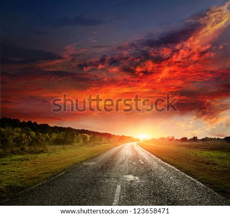 paved country road with surprisingly beautiful sky