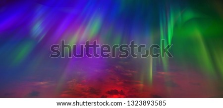 Northern lights, sky close-up. All colors are razhugi. Great view. The whole palette of colors in the same sky
