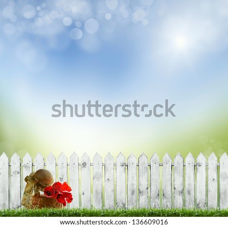 old white fence on a background of blue sky. bokeh