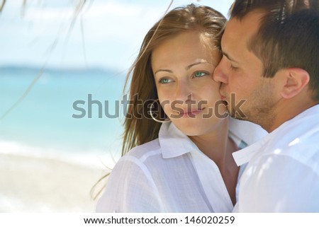 portrait of young happy beautiful couple on nature