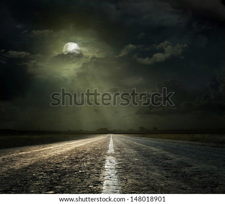 Dramatic Sky Over An Asphalt Road