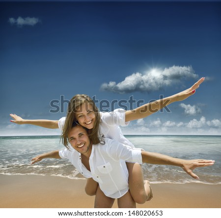 young people on a tropical beach young people on a tropical beach