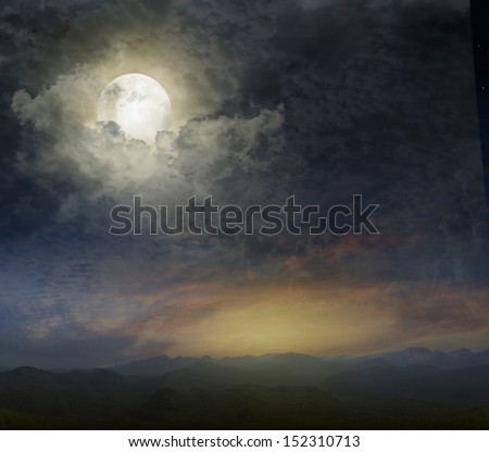 Mountain landscape in the evening with the moon