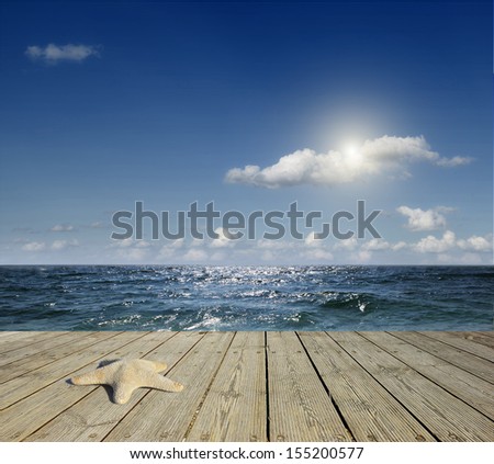 Blue ocean and blue sky with sun