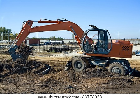 Excavator to dig the ground at a construction site