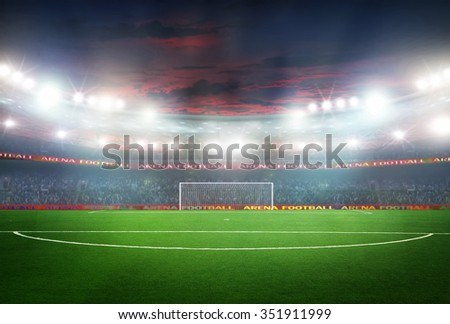 Soccer ball on the field of stadium with light