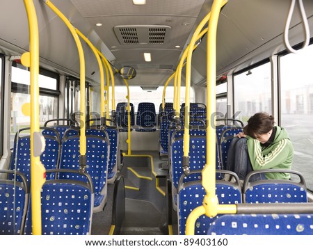 Sad woman alone on the bus