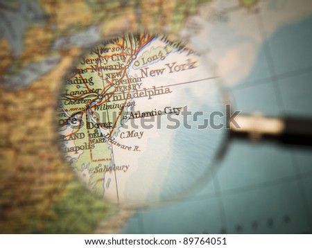 Magnifying Glass in front of an Atlantic City map