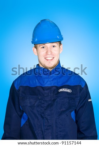 Portrait of a Manual Worker on blue background