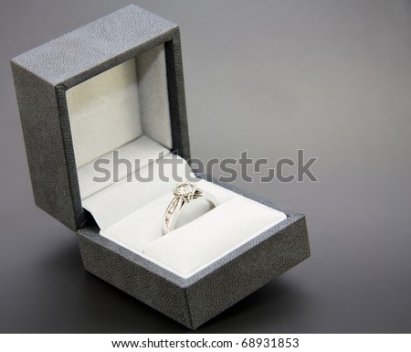 White Gold and Diamond Engagement Ring in a black and white box