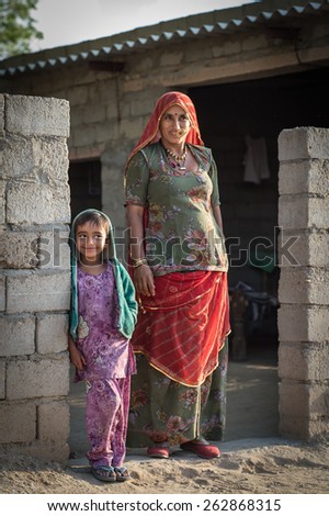 Rohat , INDIA -?? MARCH 3, 2015: portrait of a Bishnoi woman with child on March 3, 2015, Rohat, India. Bishnois are known as the first environment conservationists in the world.
